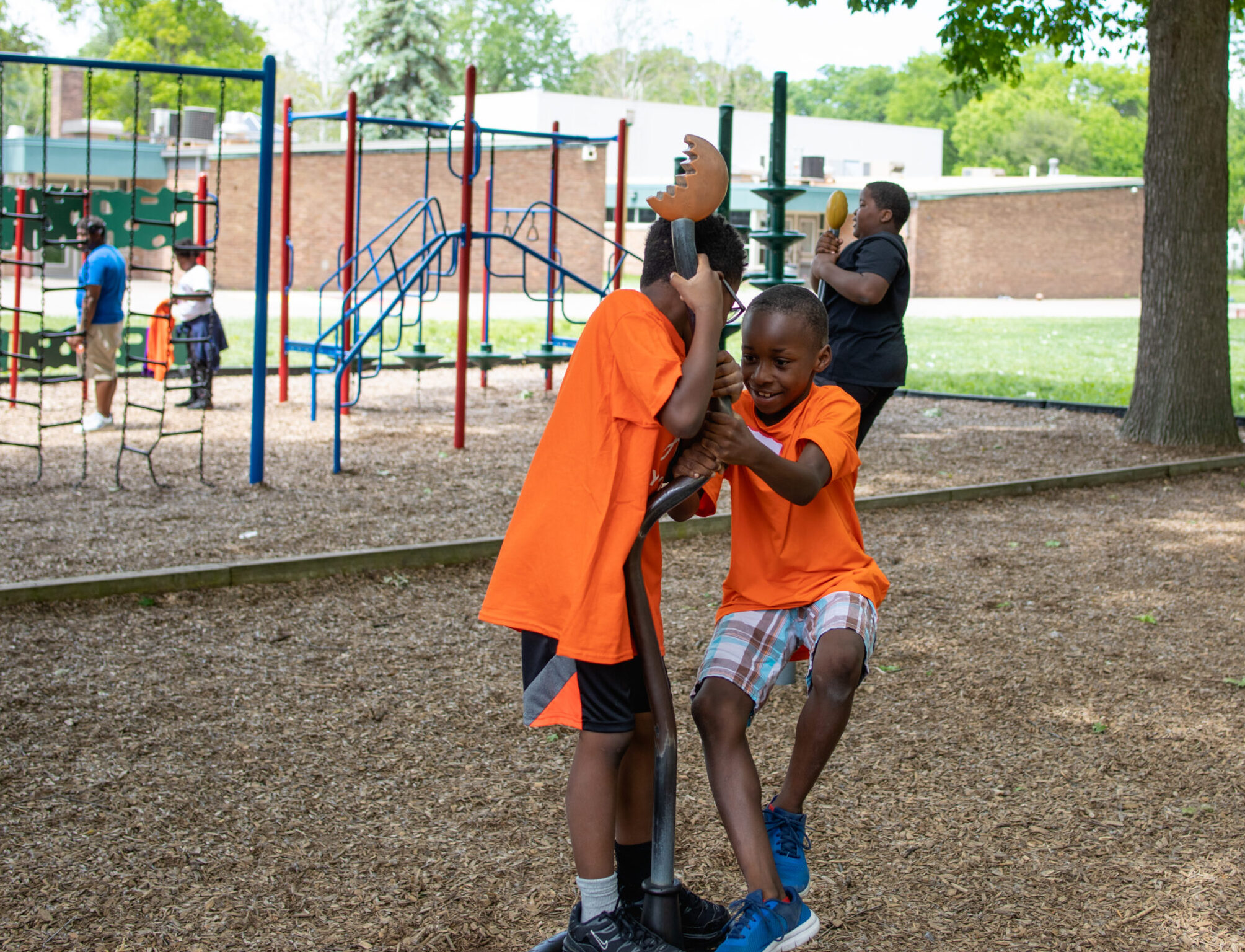 Kids playing on play structure